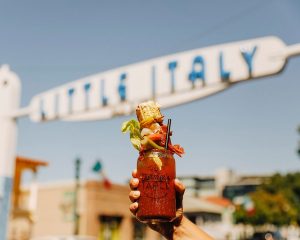 A picture of someone holding a Bloody Mary from The farmers table restaurant