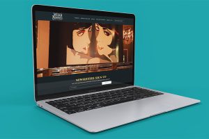 A laptop featuring the Madam Bonnies mainpage from their website.